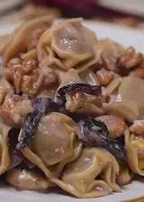Ricetta Tortellini alla carne con gorgonzola, radicchio e noci