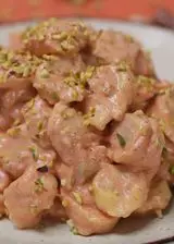 Ricetta Tortellini al prosciutto crudo con caprino, pomodoro secco e pistacchi
