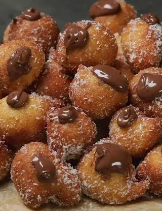 Ricetta Frittelle al cocco ripiene di Nutella di altacucina