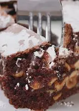 Ricetta Torta brownies al cioccolato e nocciole meringata