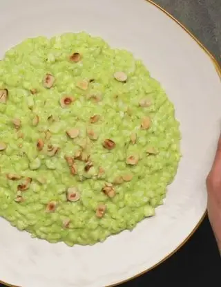 Ricetta Risotto con crema di zucchine, taleggio e nocciole di altacucina