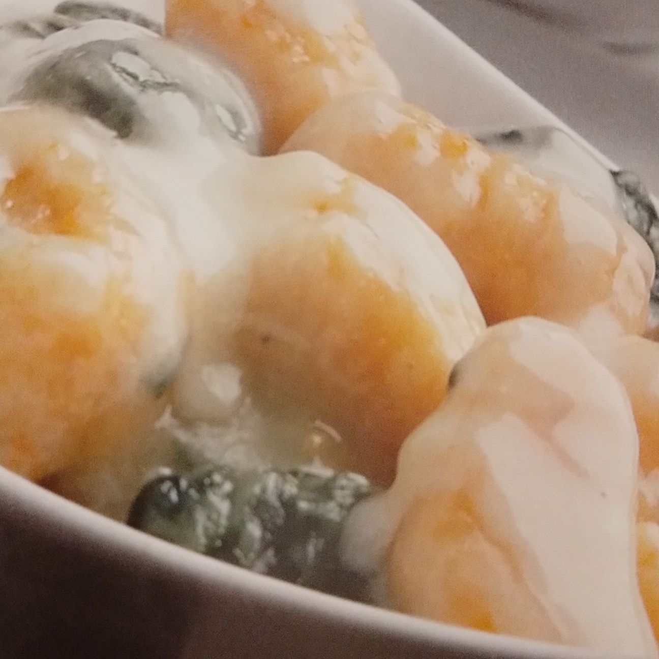 Gnocchi di zucca e spinaci con salsa al taleggio