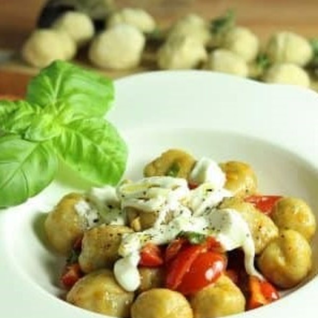 Gnocchi di melanzana, pomodorini e burrata