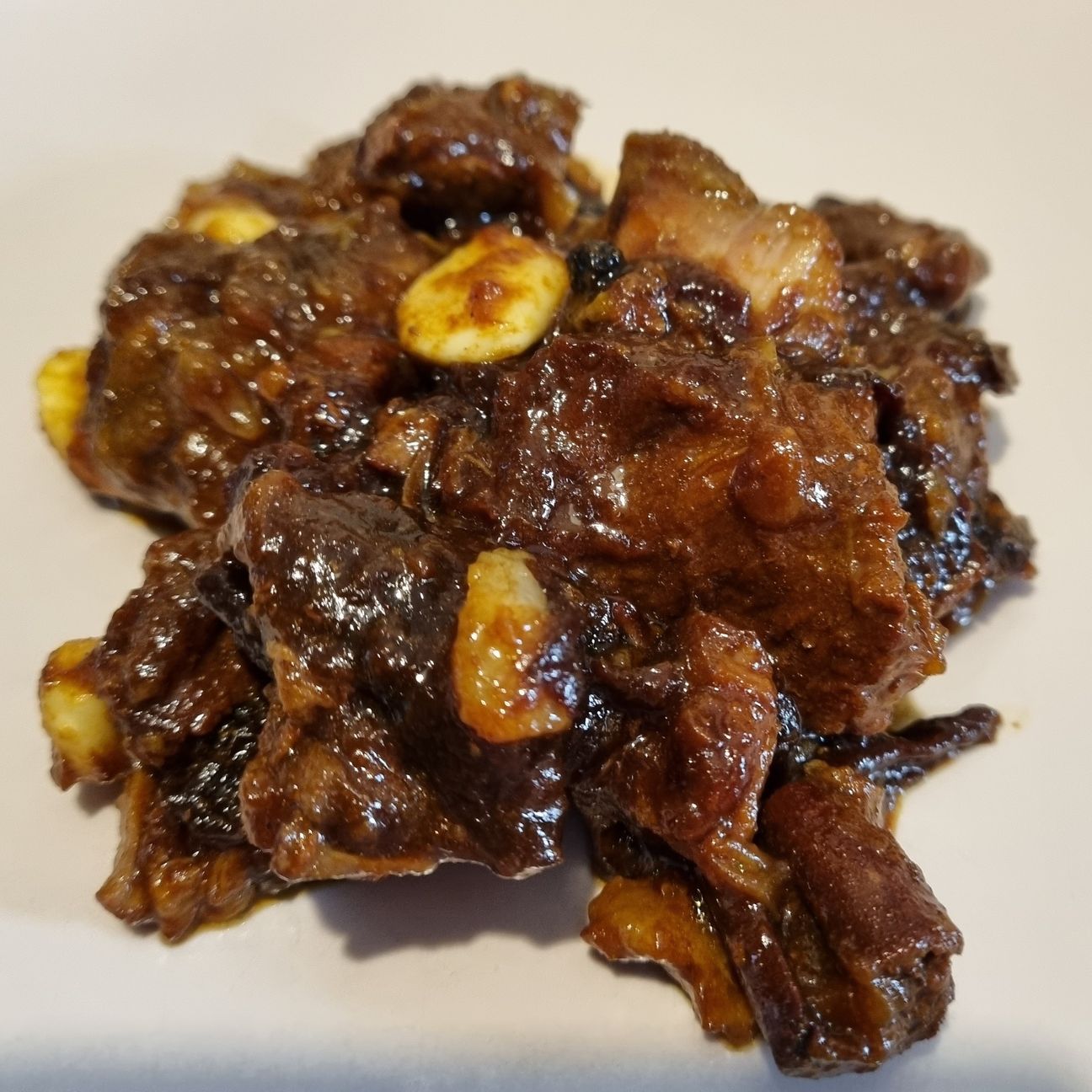 Tajine agnello prugne con cannella curcuma zenzero
