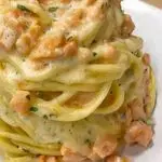Ricetta Spaghetti con crema di parmigiano e salmone