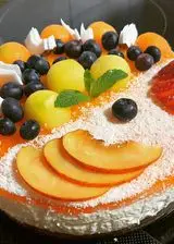 Ricetta Cheesecake al cocco e melone con decorazioni di frutta