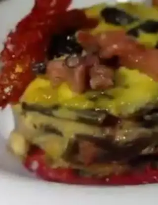Ricetta Lasagne al nero di seppia con ragù di polpo e besciamella al mango di amaurix.arancio