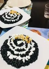 Ricetta Carnaroli nero di seppia e stracciatella di burrata