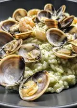 Ricetta Risotto con crema di zucchine gamberi e vongole