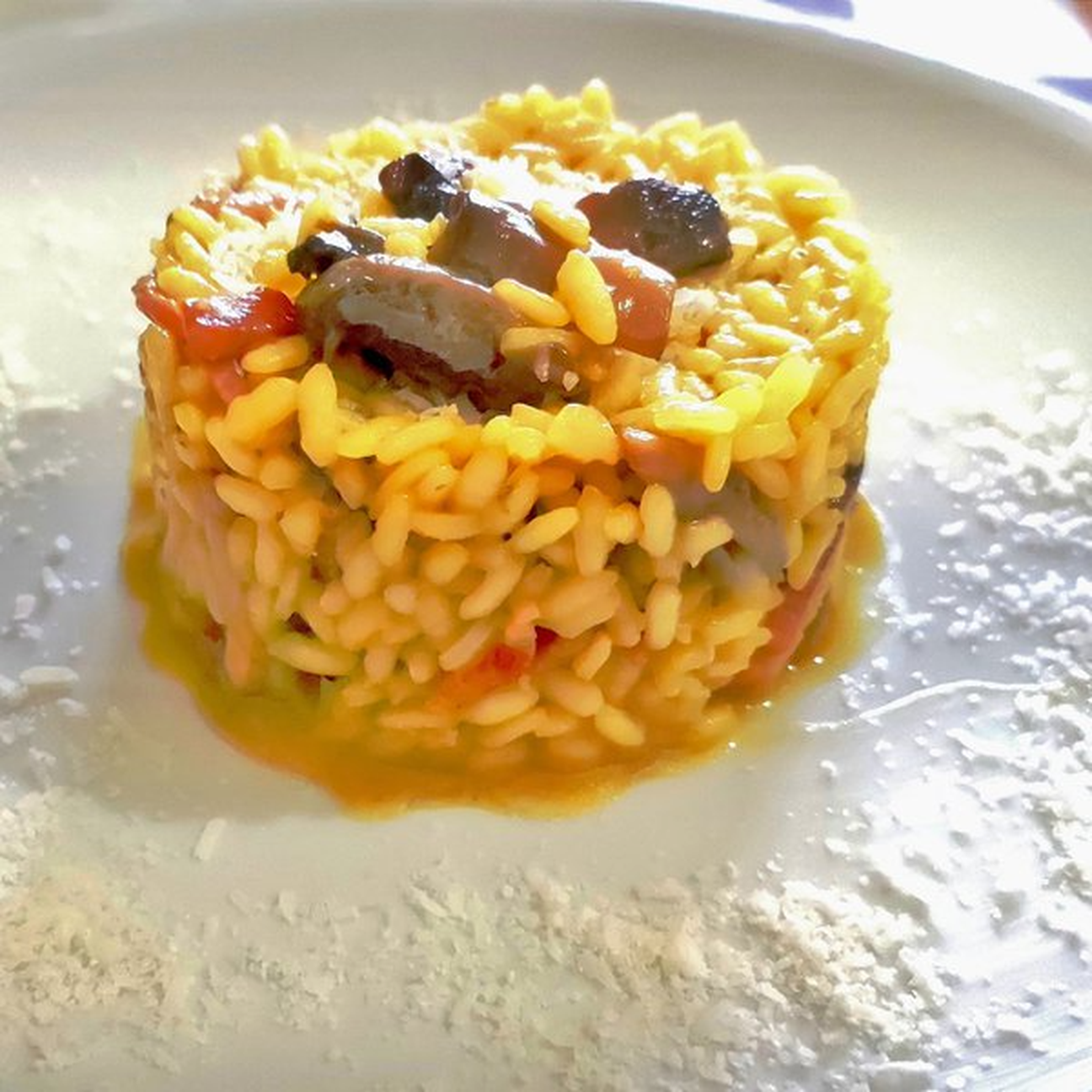 Risotto con speck funghi e zafferano