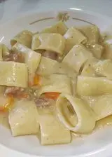 Ricetta Calamarata con salsiccia e besciamella.