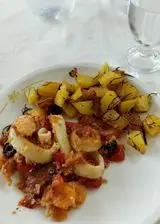 Ricetta Calamari e gamberi gratinati al forno con patate.
