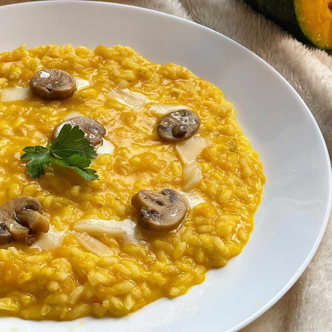 Risotto alla zucca con champignons e fonduta