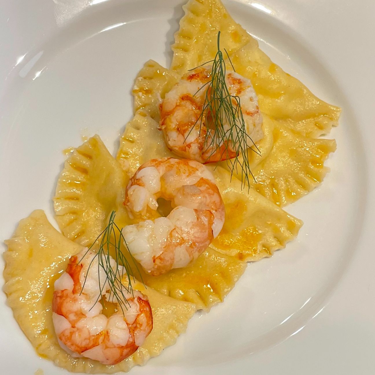 Ravioli ricotta limone zenzero e gamberi