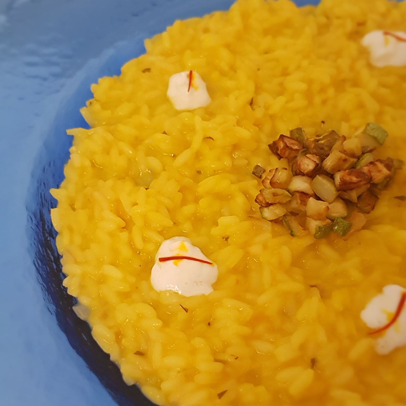 Risotto zafferano zucchine e crema di burrata