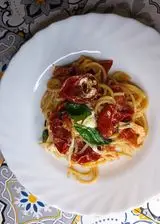 Ricetta Spaghetti con pomodorini confit e burrata
