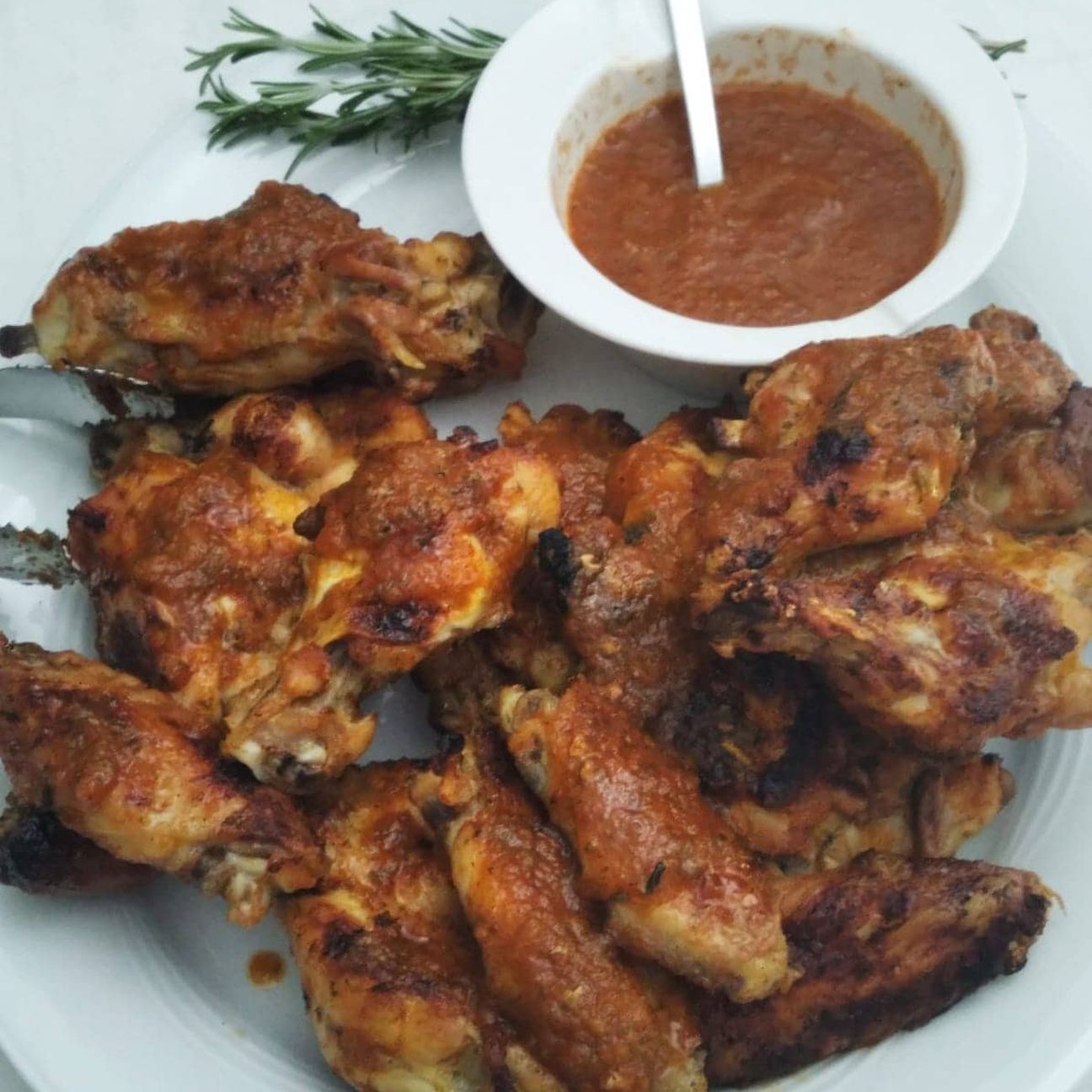 Ali di pollo in salsa di peperoni