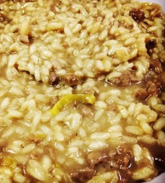 Risotto salsiccia e funghi misti Al.ta Cucina