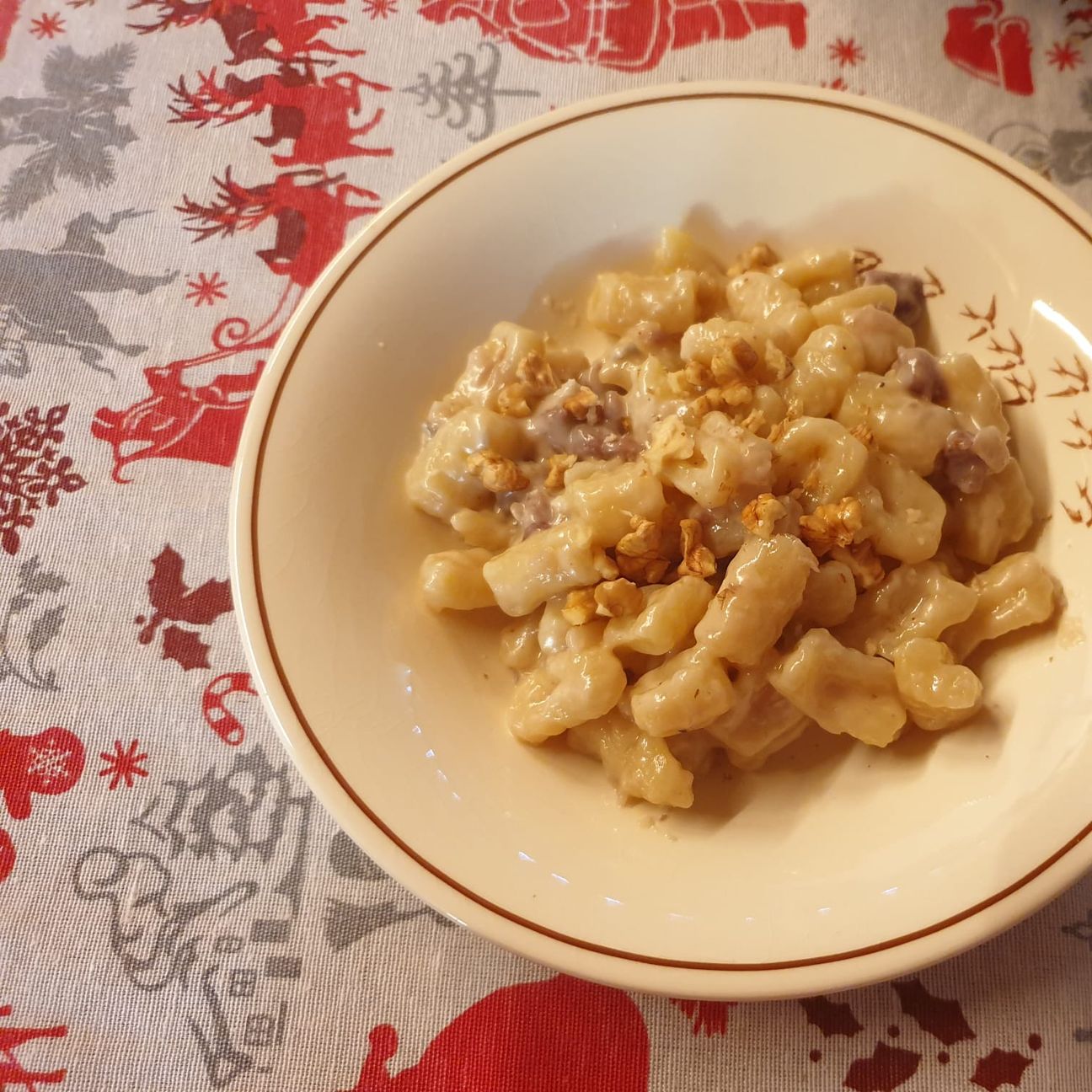 Gnocchi salsiccia, gorgonzola e noci