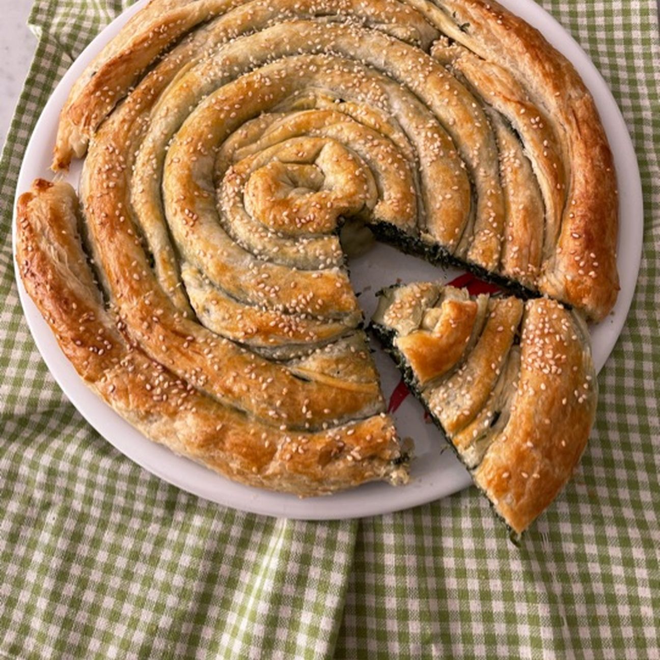 Girella di sfoglia con ricotta e spinaci