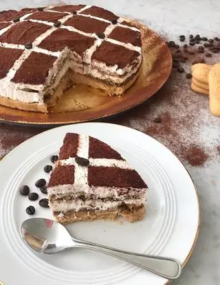 Ricetta Cheesecake Tiramisú  senza uova  di midivertoacucinare