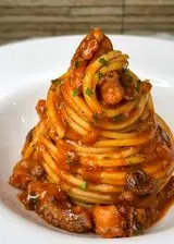 Ricetta Spaghetti con ragú di polpo🐙