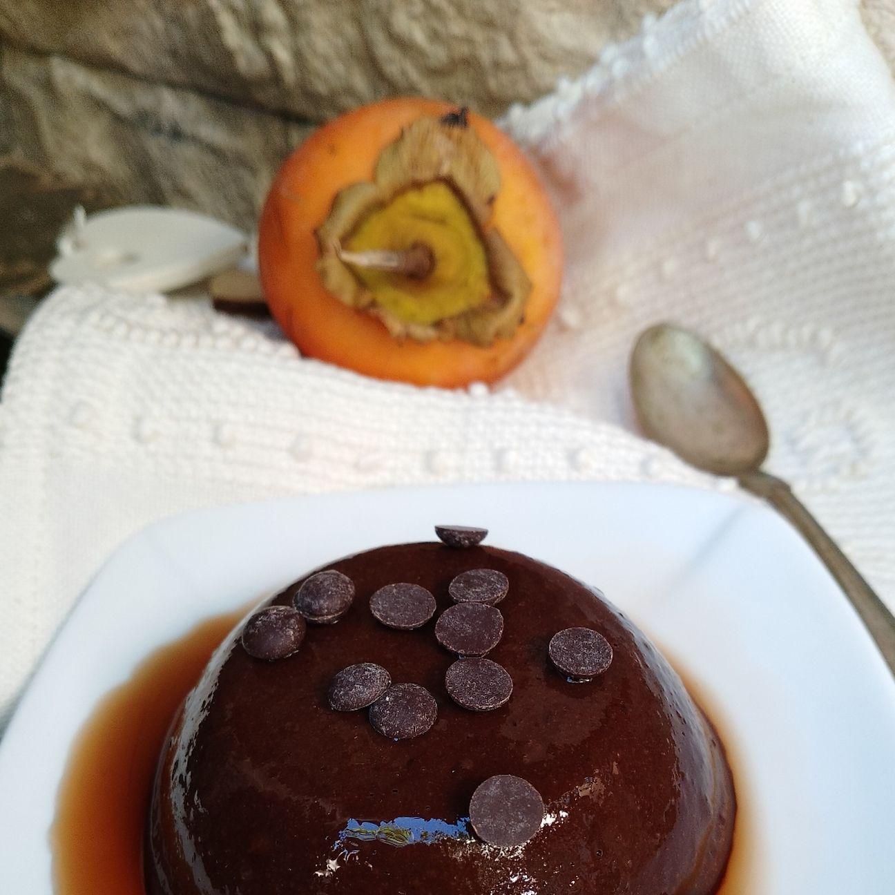 Budino di cachi, cacao e Brandy