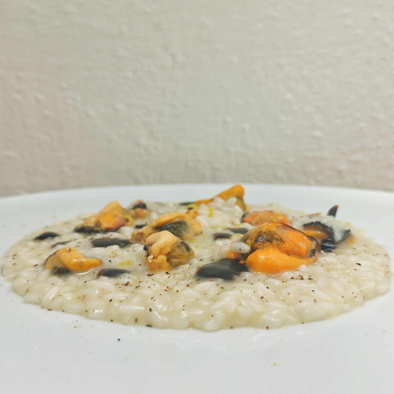 Risotto cacio pepe cozze vin cotto di fichi
