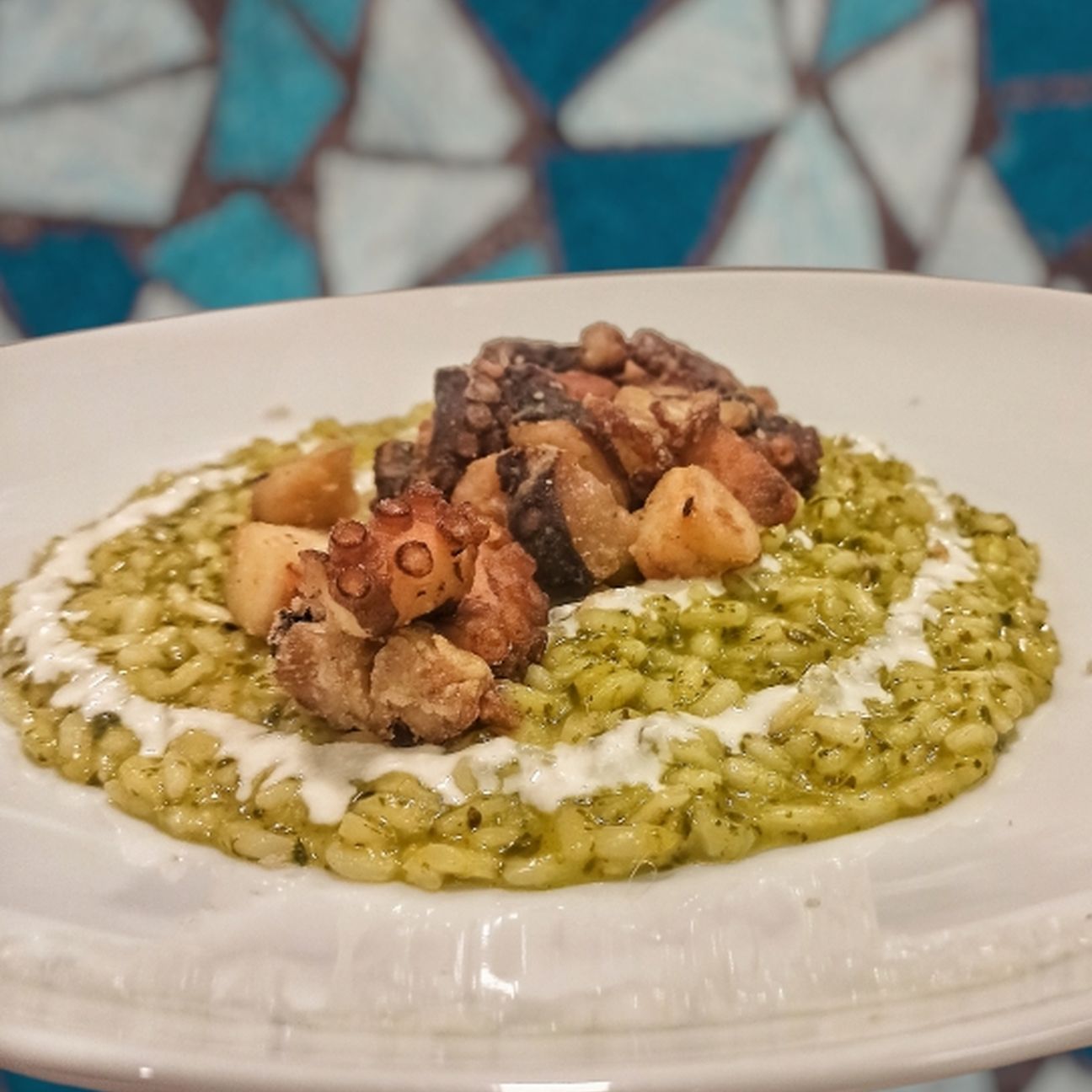 Risotto alla cima di rapa polpo croccante e burrata