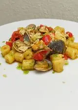 Ricetta Tubetti di patate cozze vongole e datterino infornato