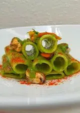 Ricetta Rigatoni con crema di cima di zucchina cozze e peperone crusco