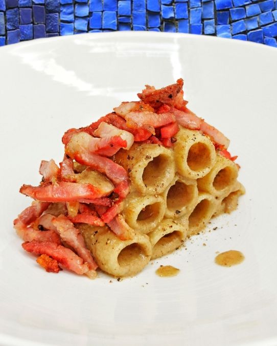 Rigatoni con porcini estivi speck croccante