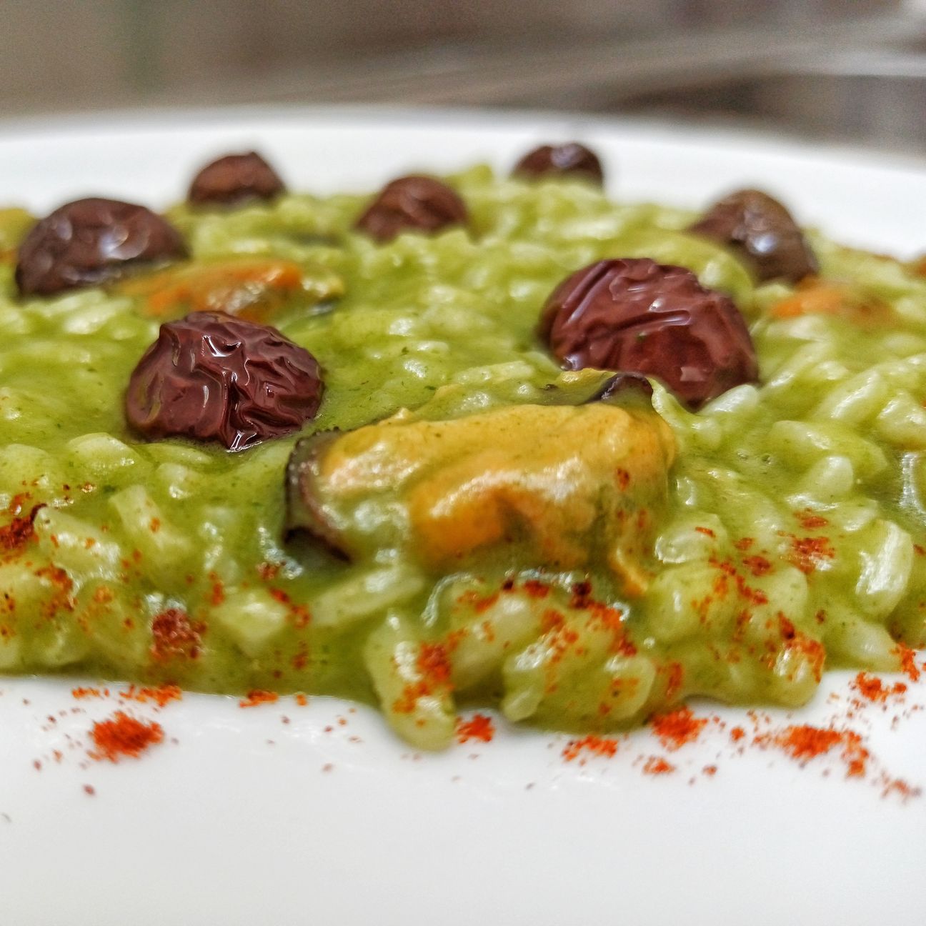 Risotto cime di rape cozze e olive dolci