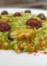 Ricetta Risotto cime di rape cozze e olive dolci