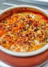 Ricetta Gnocchi con ragù di brasciola stracciatella pistacchi