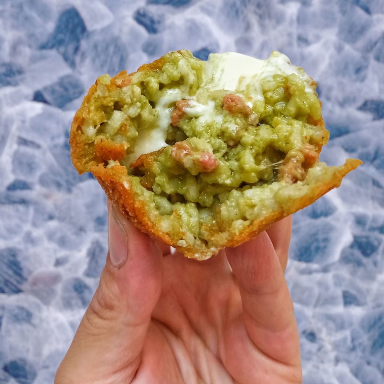 Arancina con rape salsiccia provola