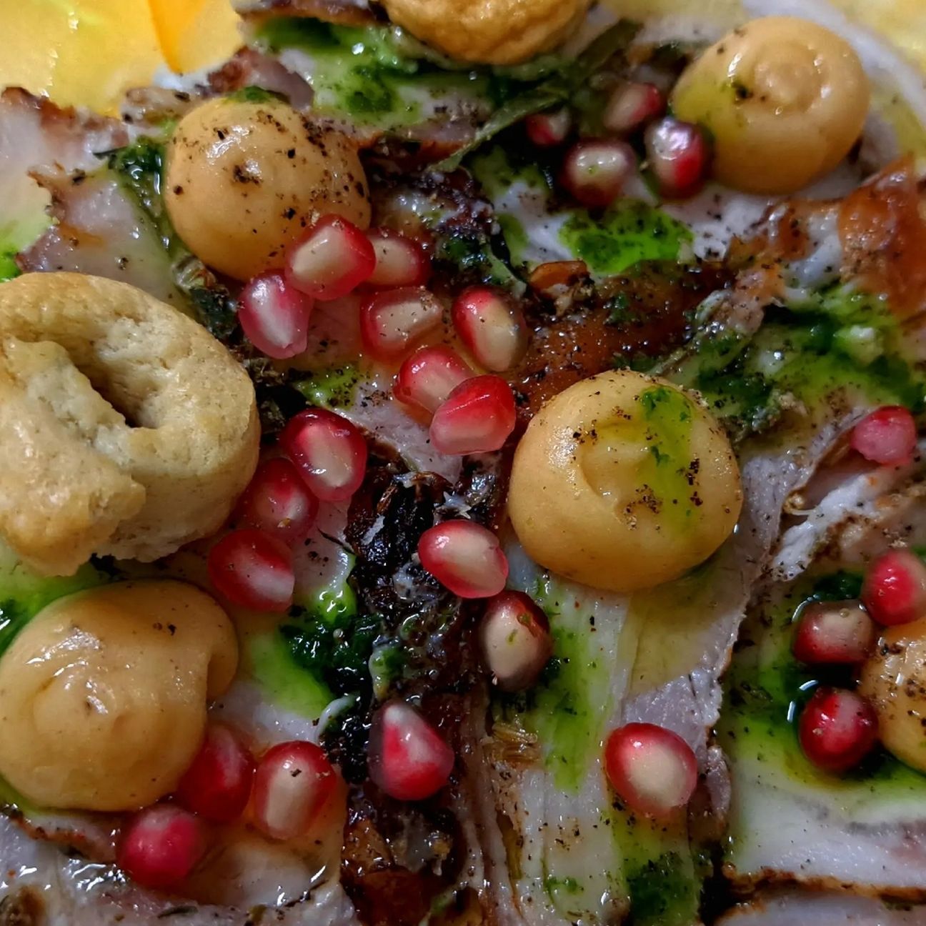Carpaccio di Porchetta con chutney di Loti e Melograna