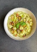 Ricetta Gnocchi con crema di zucchine, philadelphia e pancetta croccante