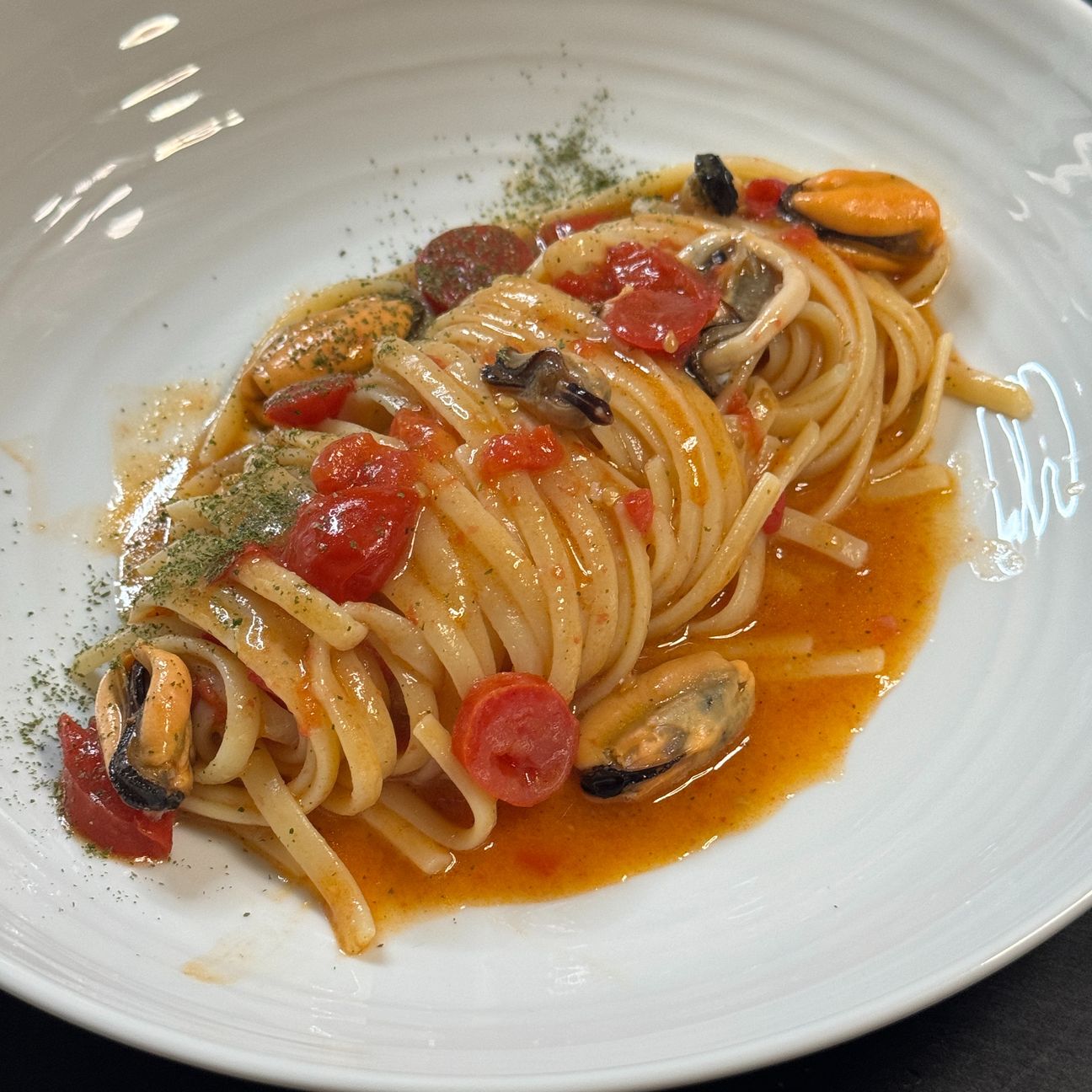 Spaghetti con cozze e datterini