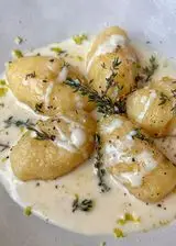 Ricetta Gnocchi ripieni di formaggio su crema di gorgonzola e lime