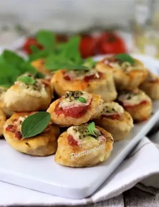 Ricetta Pizzette da aperitivo di Piattipertutti