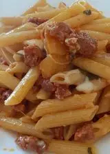 Ricetta Penne rigate con salsiccia patate e mozzarella