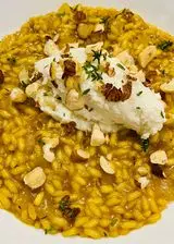 Ricetta Risotto alla zucca con mousse di parmigiano, nocciole tostate e timo