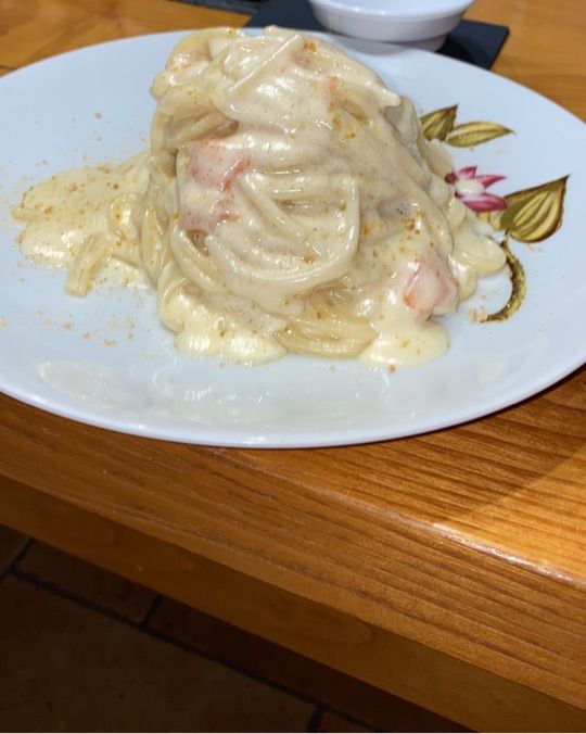Spaghetto scalanato con crema di parmigiano 40 mesi, zenzero e salmone