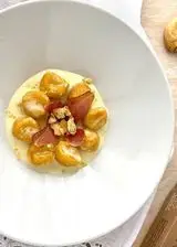 Ricetta Gnocchi di zucca con speck, crema di stracchino e taralli