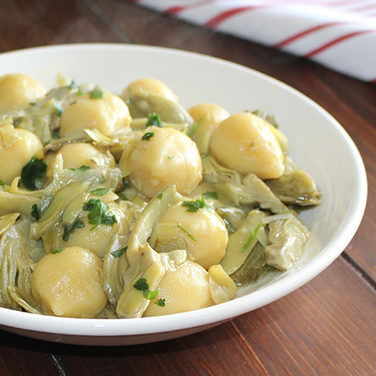 Gnocchi ripieni con pomodoro e mozzarella ai carciofi