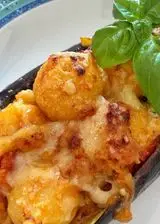 Ricetta Gnocchi ripieni di pomodoro e mozzarella in barchetta di melanzane