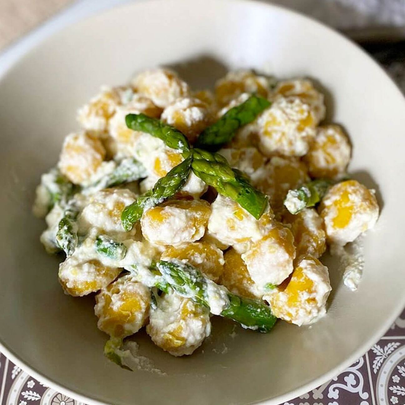 Gnocchi alla zucca con ricotta e punte di asparagi