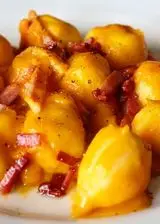 Ricetta Gnocchi ripieni al Gorgonzola con crema di zucca e speck