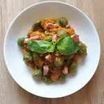 Ricetta Gnocchi di ricotta e spinaci con zucchine e pomodorini